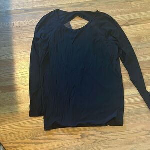 Sheer black lululemon shirt with open crossover back
